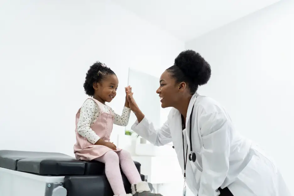 Doctor with child patient